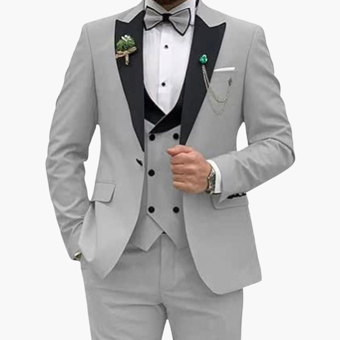 Men's slim fit three-piece black tuxedo with satin lapel jacket and matching vest for weddings