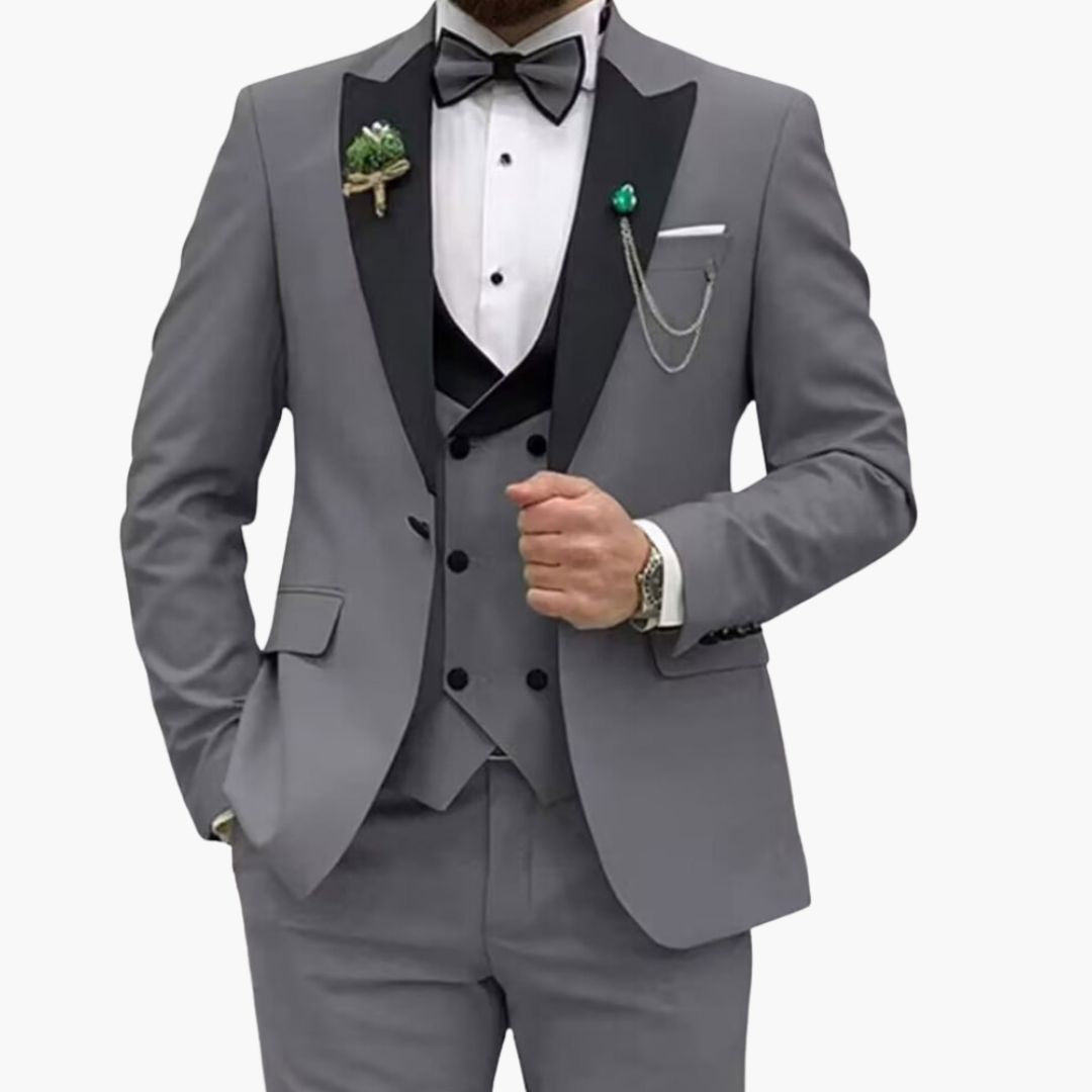 Men's slim fit three-piece black tuxedo with satin lapel jacket and matching vest for weddings