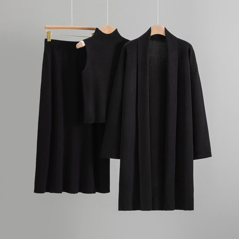 Amber knit 3-piece set cardigan sleeveless top flared midi skirt quiet luxury coordinated elegant style