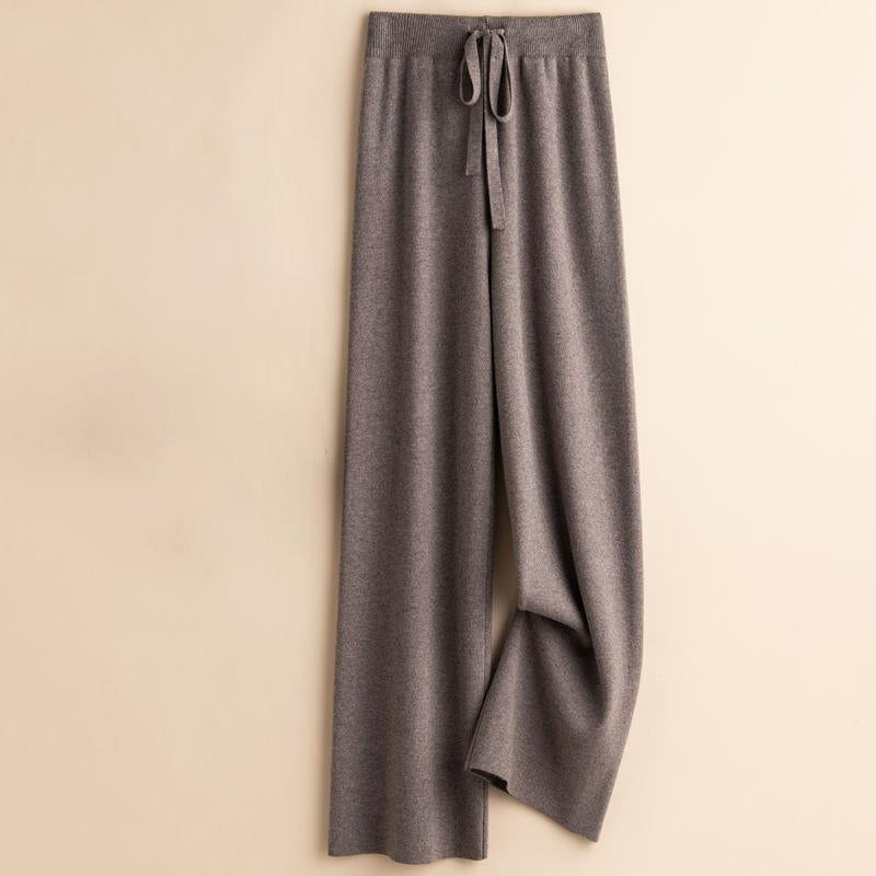 Women's ember wool knit high-waist flow pants with floor-grazing drape in warm tones