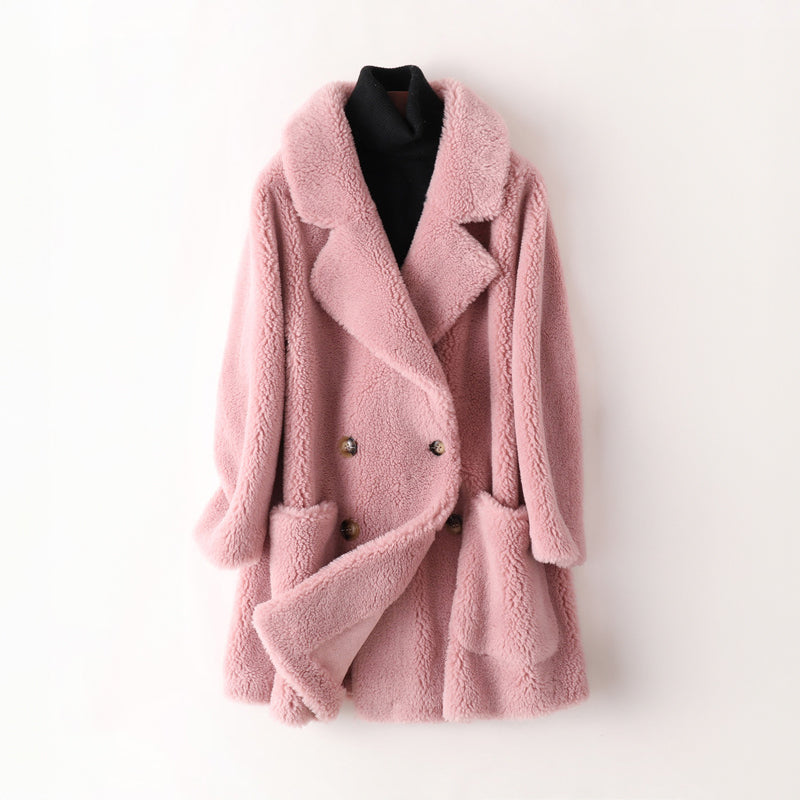 Ivory faux shearling oversized cocoon coat with plush texture and elegant relaxed silhouette