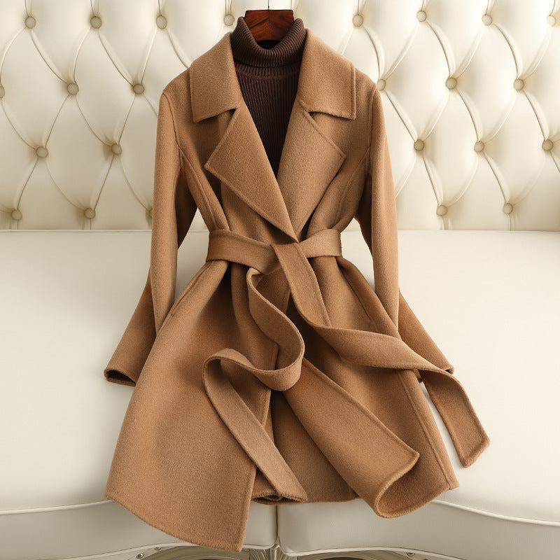 Sofia Amoretti black premium wool coat deep V-neck chic lapel collar modern professional silhouette