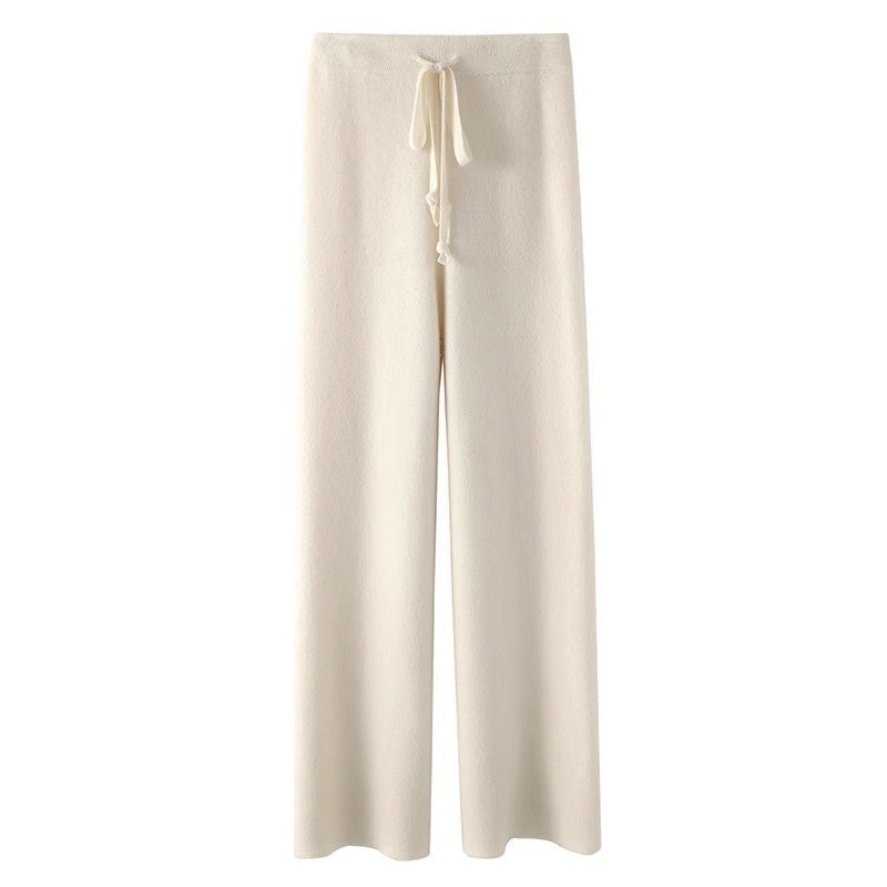 Women's knitted wide-leg pants neutral tones flowing silhouette cozy relaxed fit autumn winter