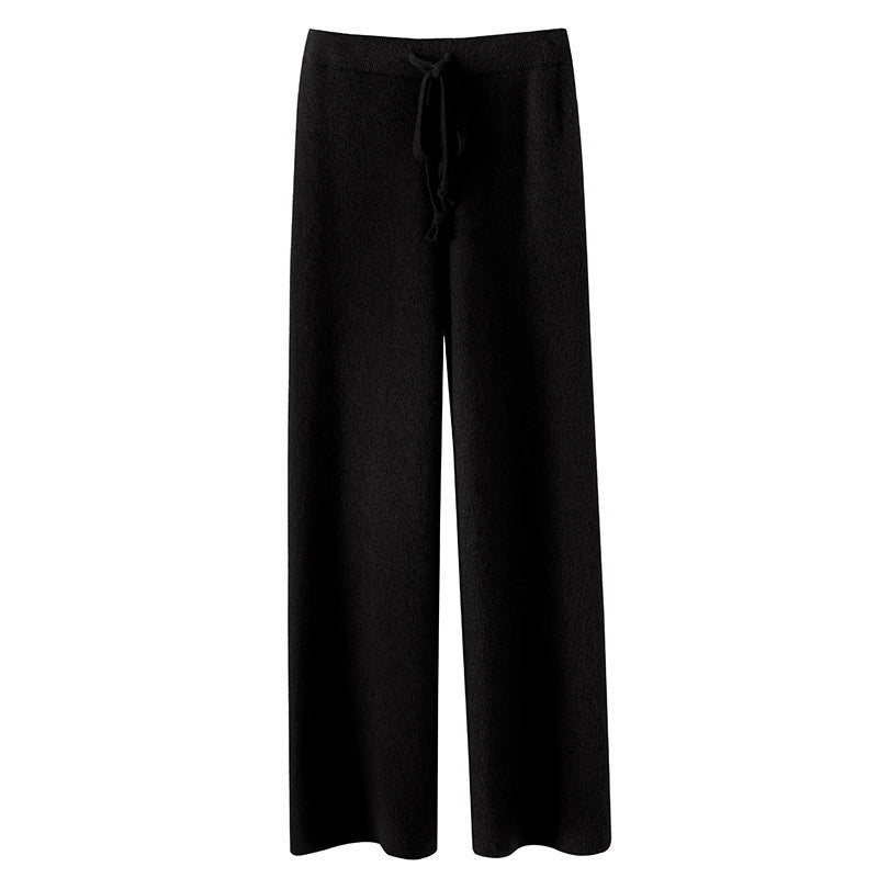 Women's beige knitted wide-leg pants flowing silhouette relaxed fit cozy autumn winter essential