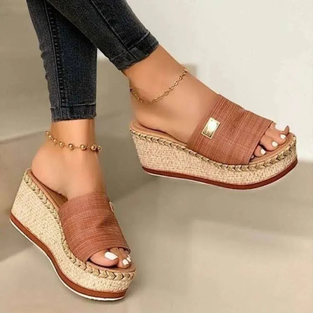 Women's beige espadrille wedge sandals with breathable fabric upper and open-toe platform design
