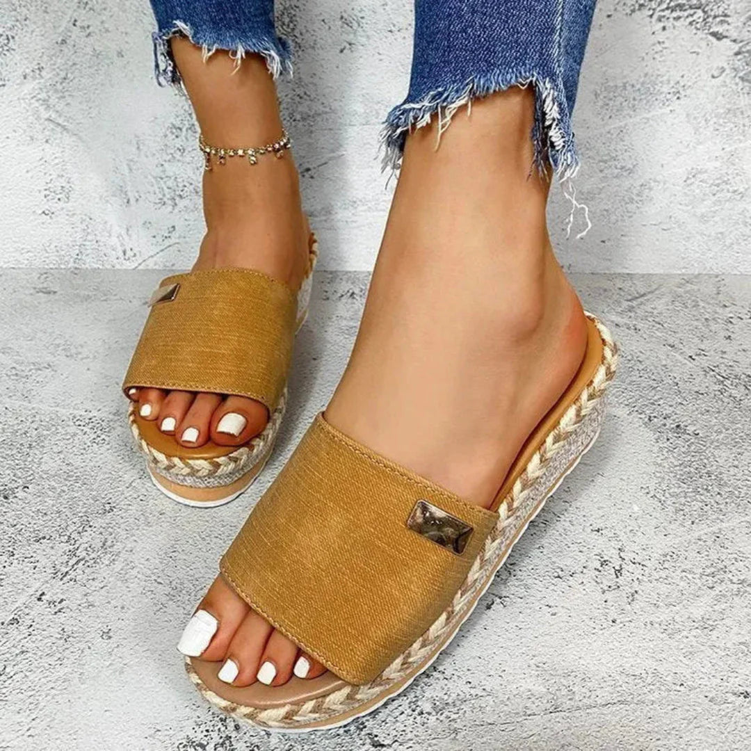 Women's beige espadrille wedge sandals with breathable fabric upper and open-toe platform design