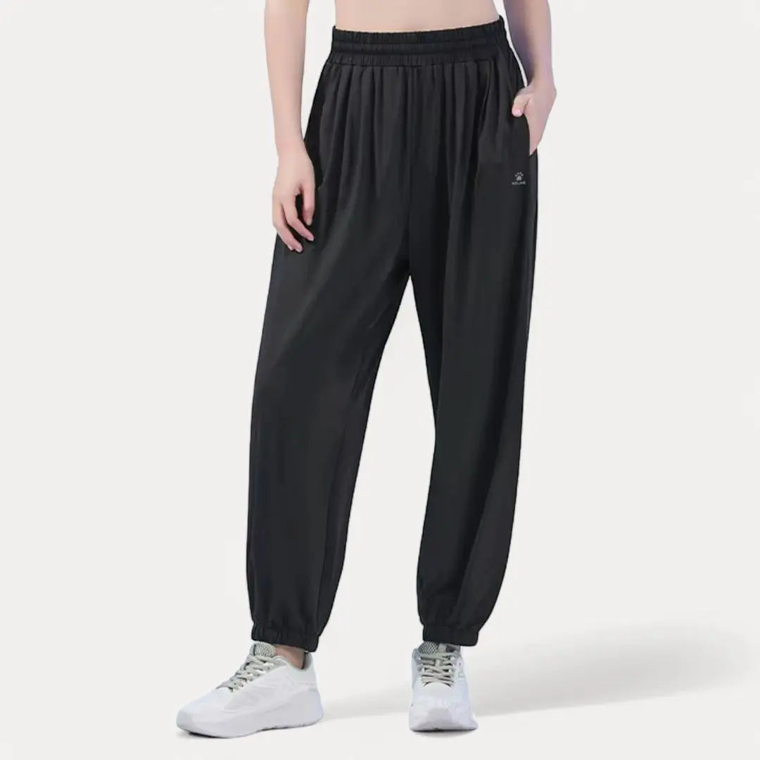 Light gray relaxed-fit active sweatpants with elastic waistband, breathable quick-dry fabric for workouts