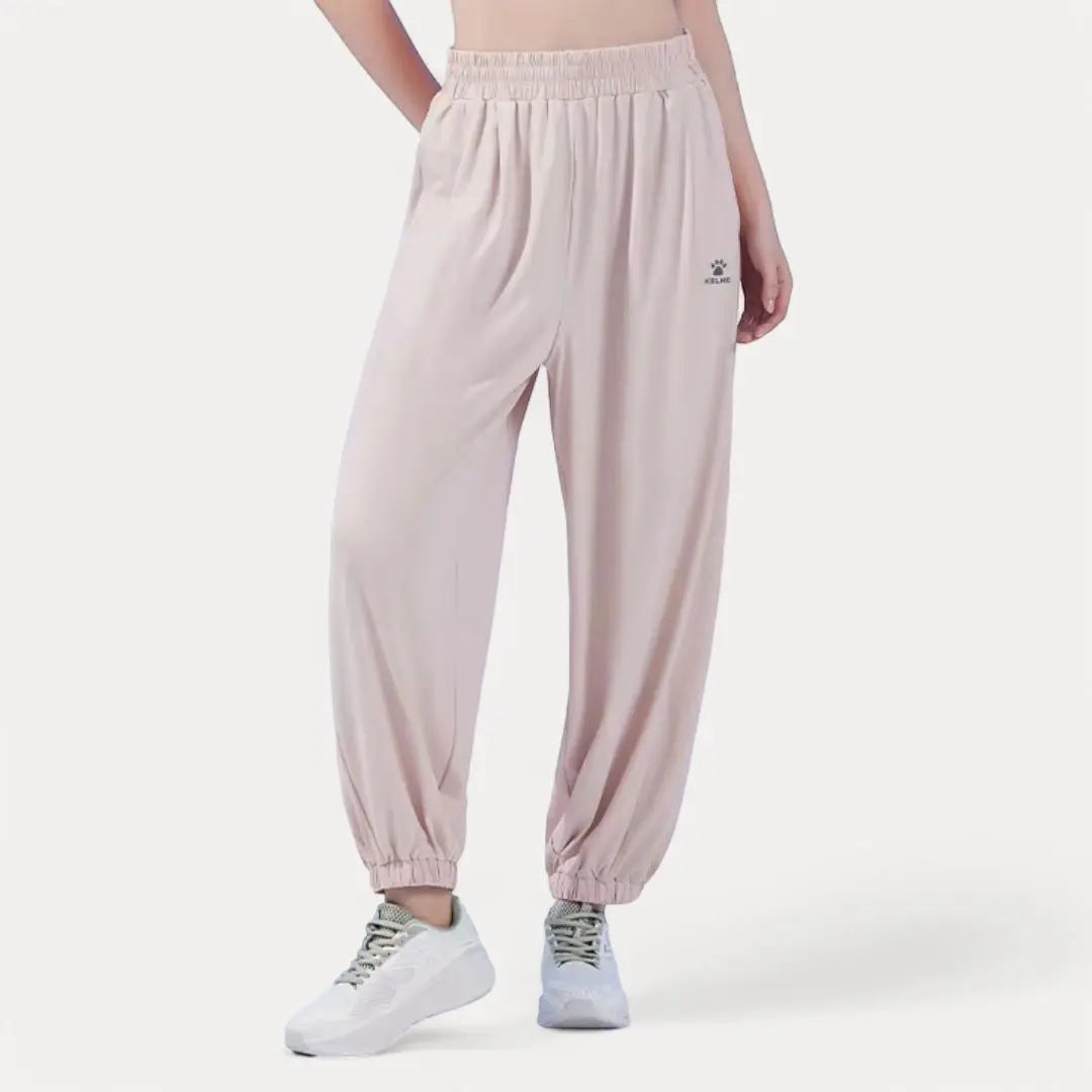 Light gray relaxed-fit active sweatpants with elastic waistband, breathable quick-dry fabric for workouts