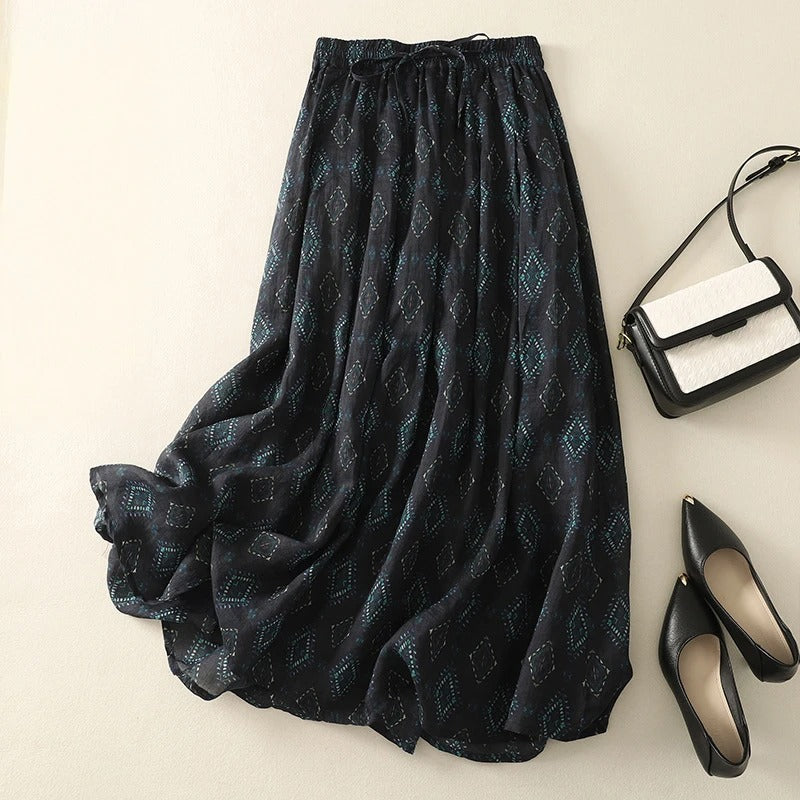 Boho chic patchwork maxi skirt in earthy tones with mosaic-inspired print and lightweight draping fabric