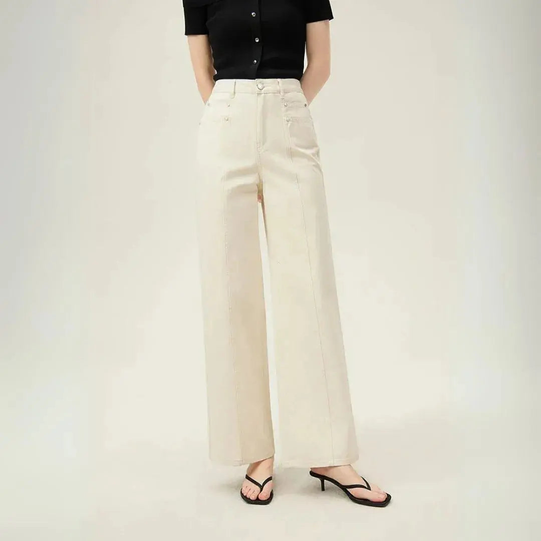 Cream high-waist wide-leg denim trousers with relaxed silhouette and structured flattering fit