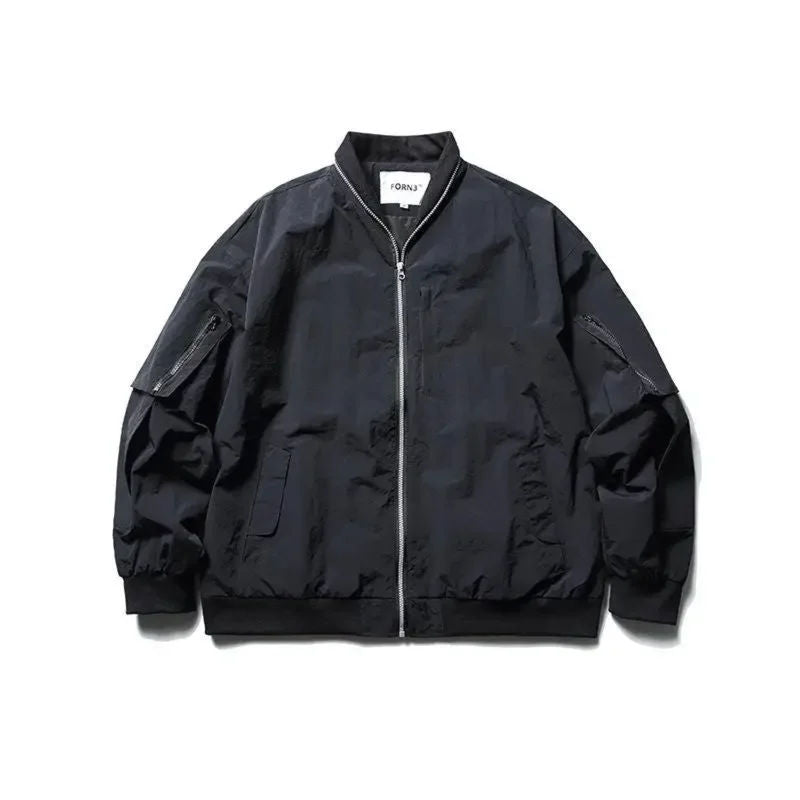 Black nylon windbreaker bomber jacket loose fit with 6 utility pockets for urban wear