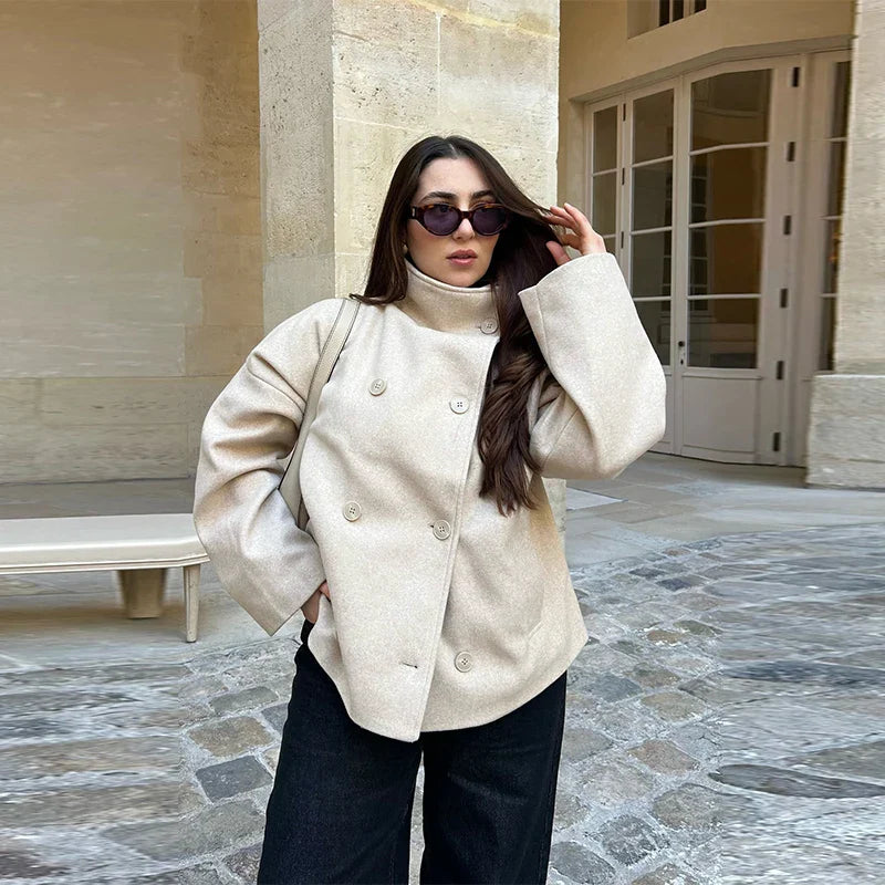 Women's cropped wool-blend pea coat with stand collar, structured silhouette in minimalist style