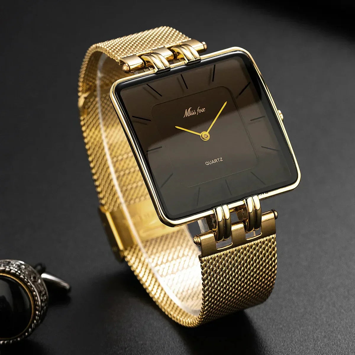 Women's square face wristwatch with silver mesh strap, easy-read markers, modern geometric dial