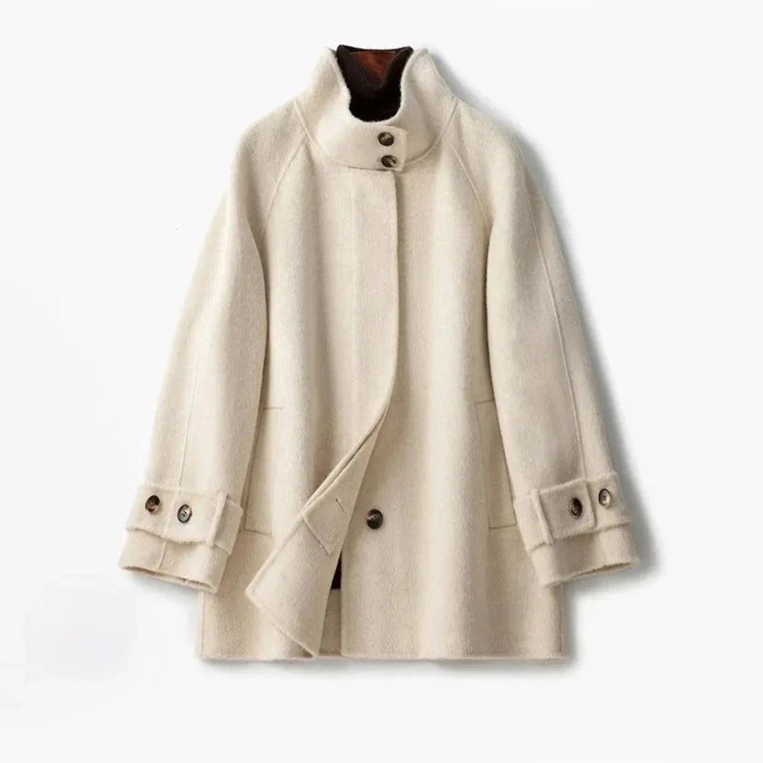 Women's camel cashmere high-neck double-breasted coat with structured silhouette and premium soft fabric