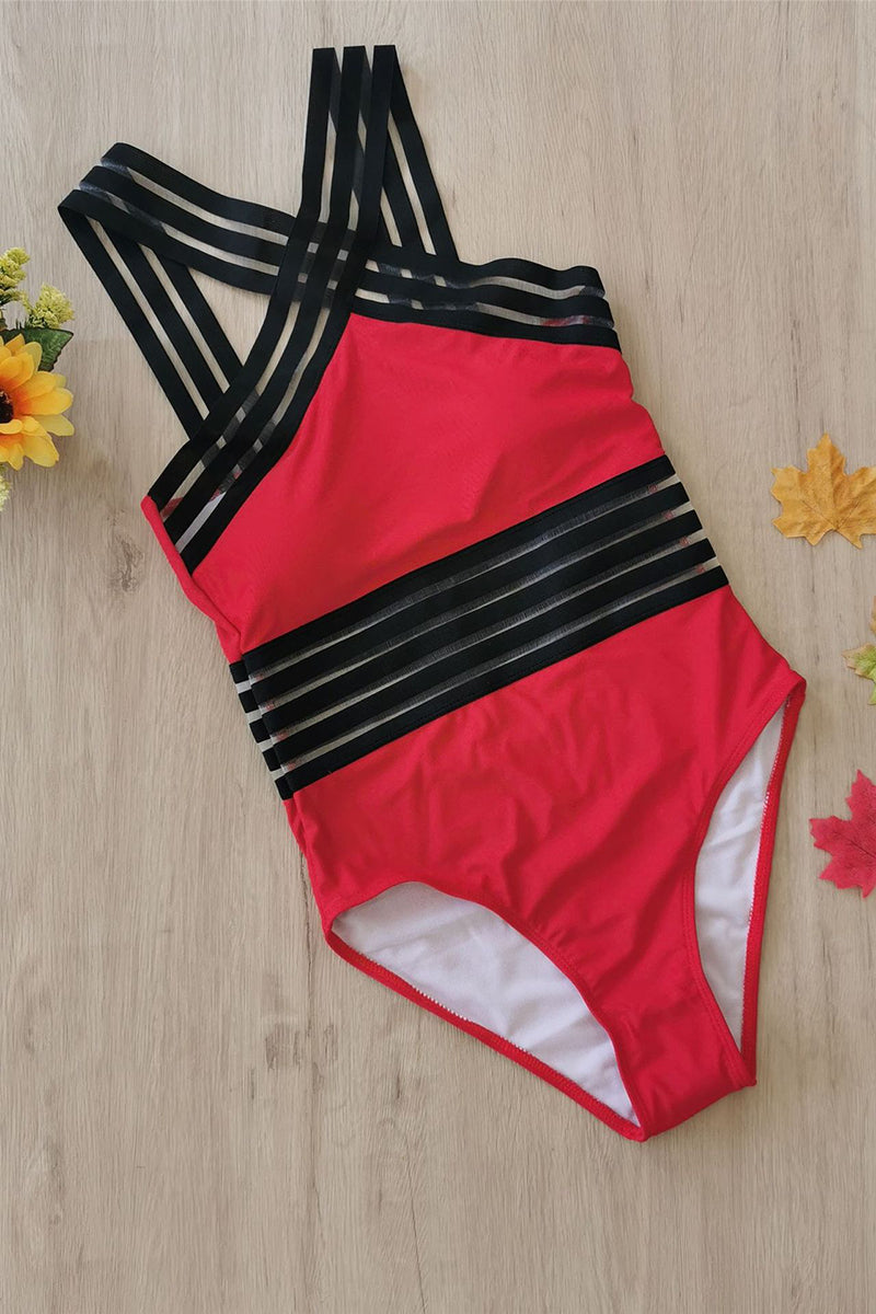Black monokini swimsuit with criss-cross halter straps, sheer striped waist bands, and sculpting fit