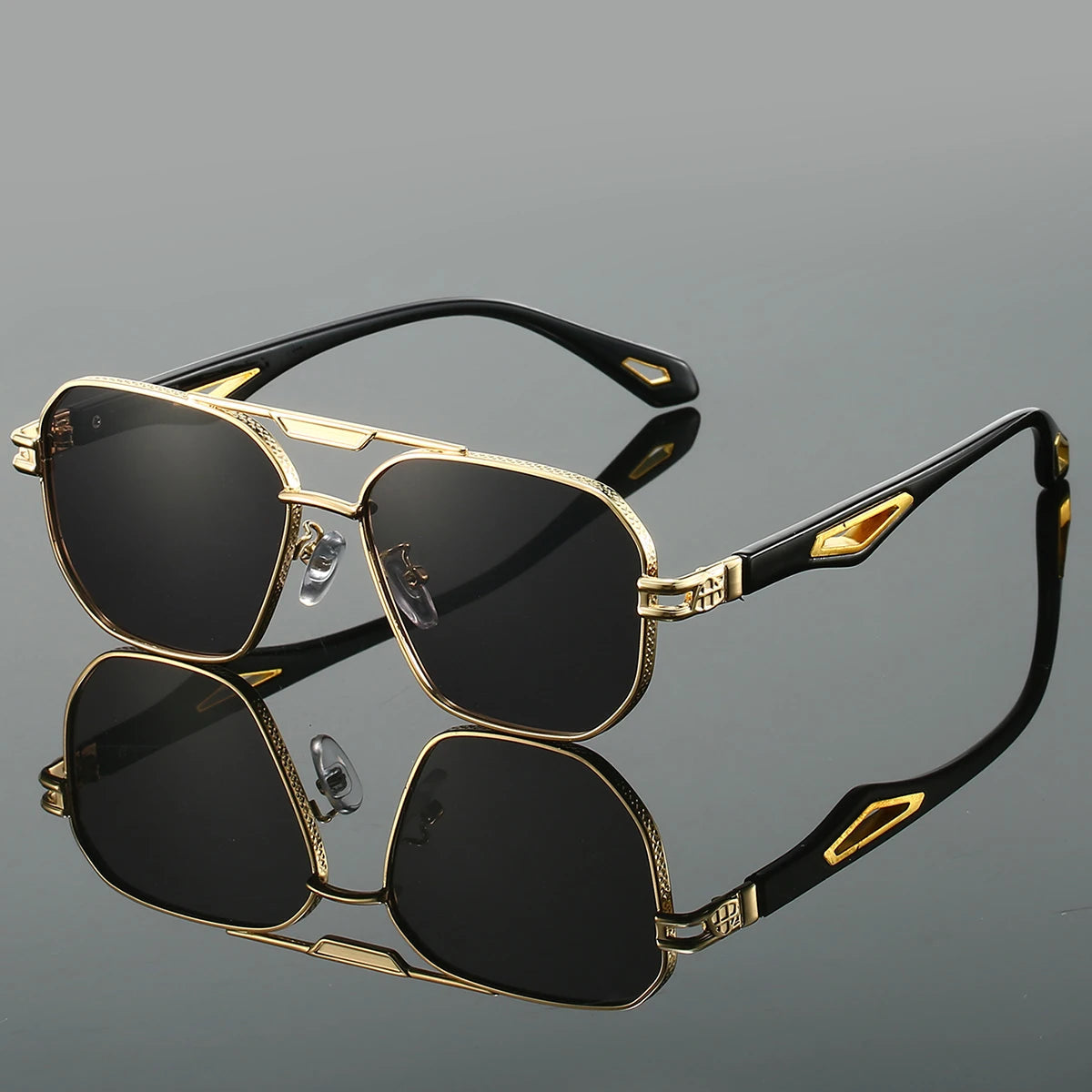 Bold UV400 aviator sunglasses with sculpted metal frame, distinctive temple inlays, and refined finish
