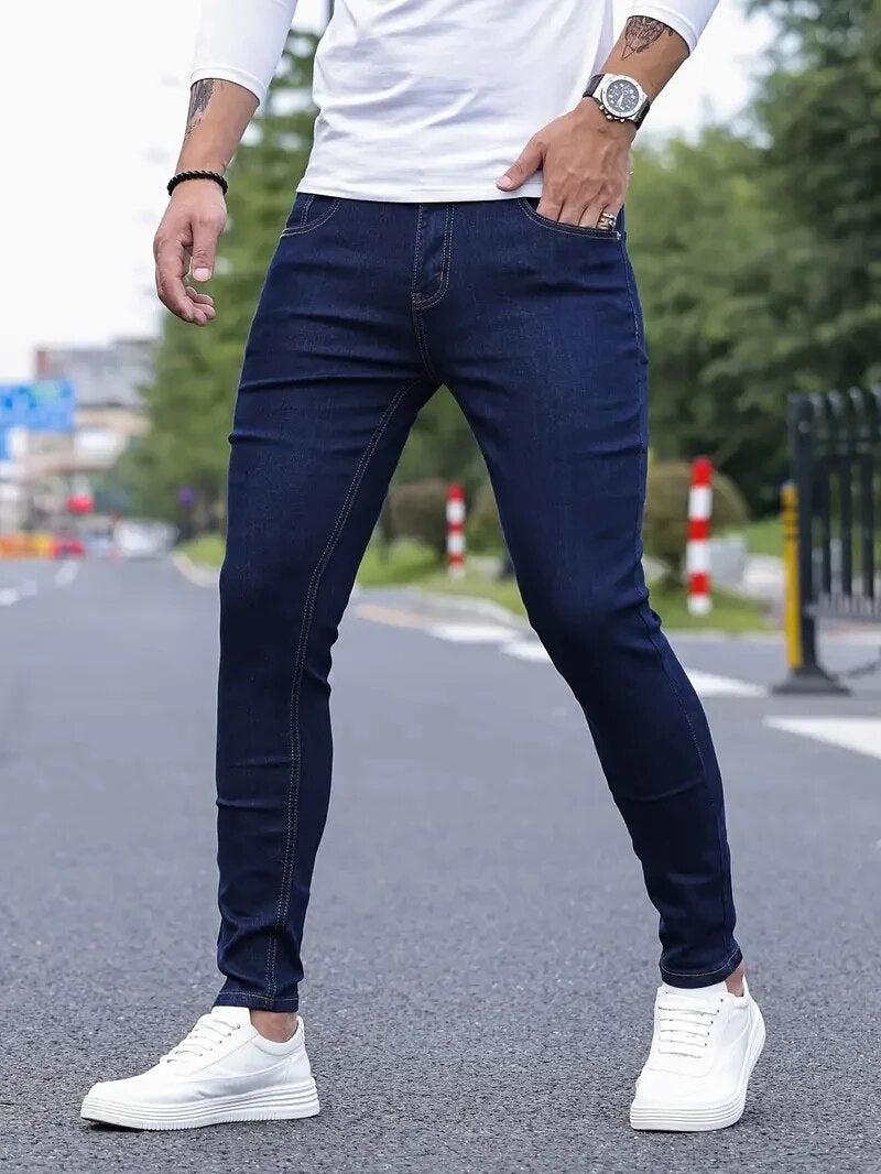 Men's dark blue stretch slim-fit jeans with tear-resistant fabric and all-day flexible comfort