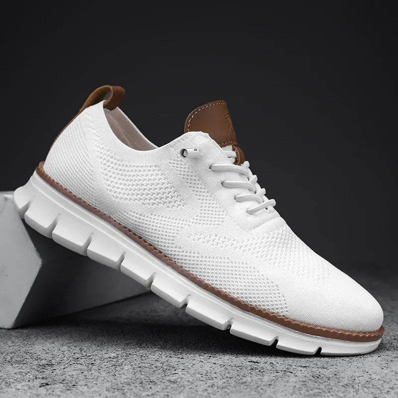 White lightweight mesh casual sneakers with breathable upper and durable rubber outsole for summer