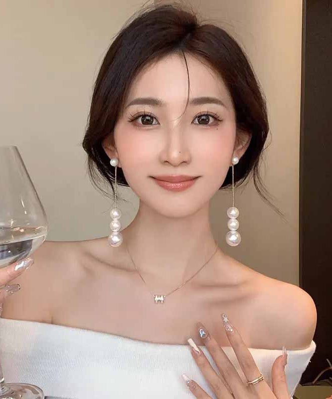Boucles d'oreilles pendantes élégantes en alliage d'or avec perles - Urbann-Vibe