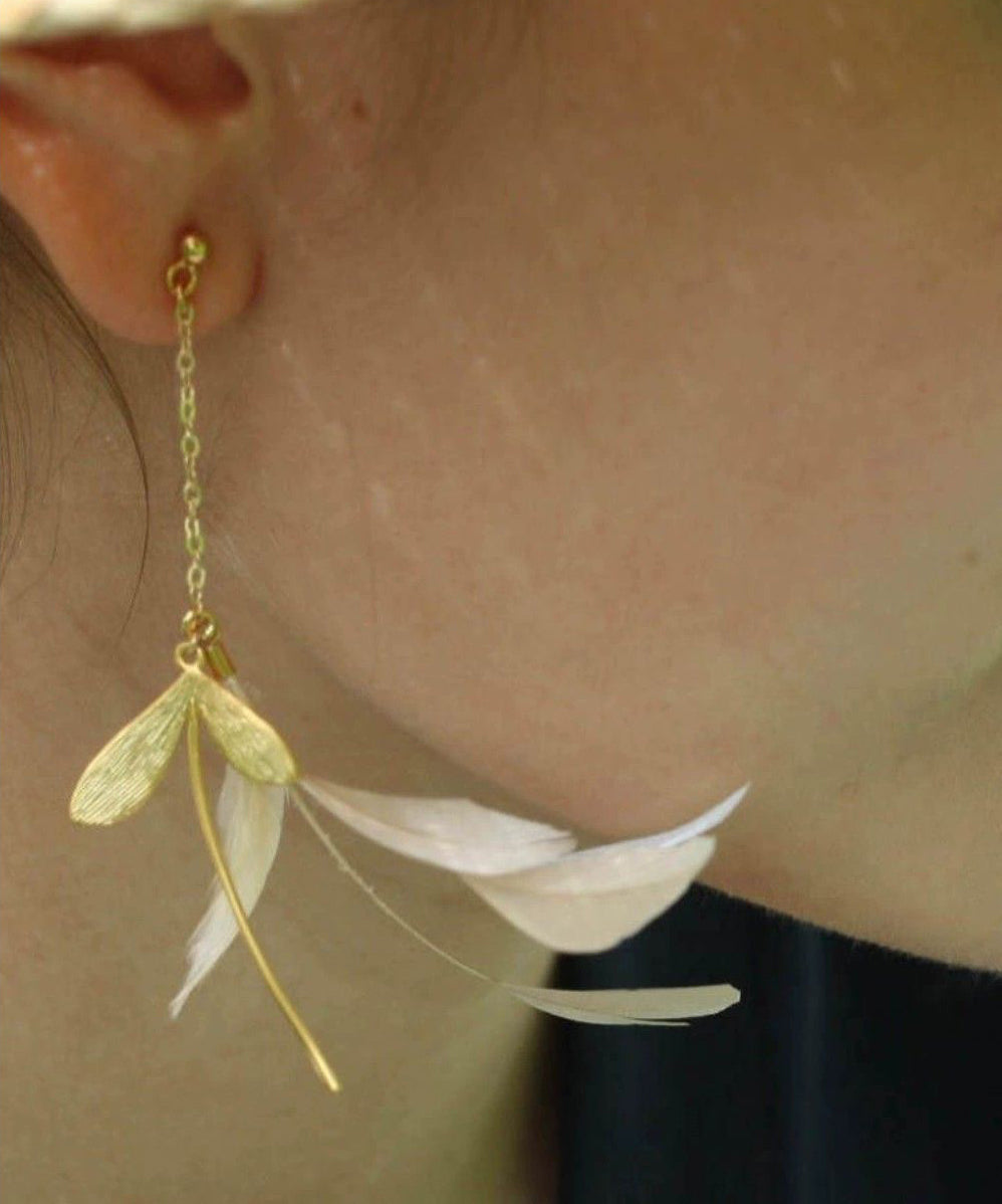 Boucles d'oreilles pendantes élégantes en forme de plume surdorée en cuivre doré - Urbann-Vibe