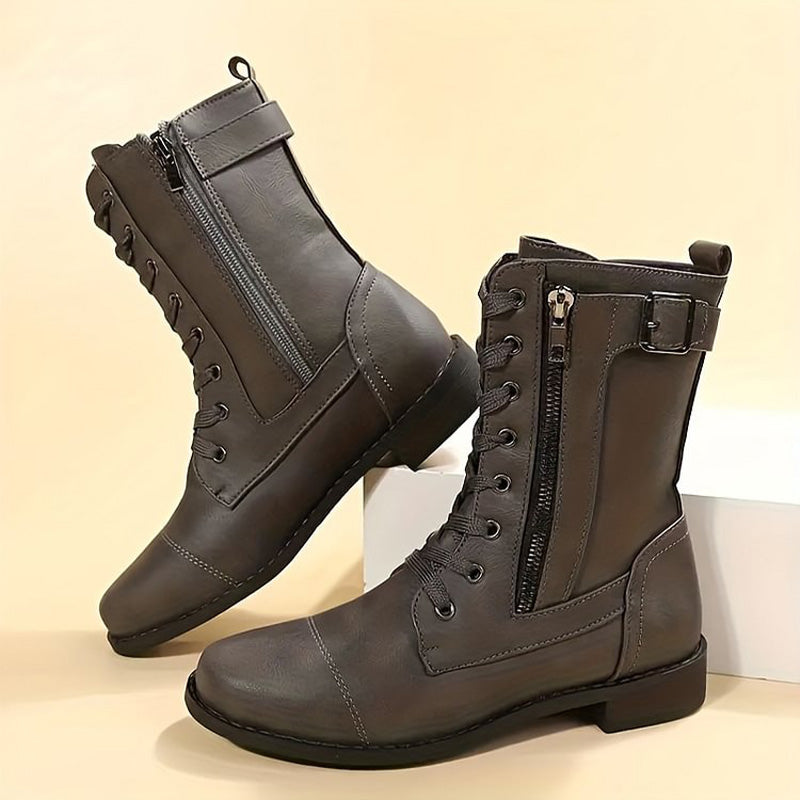 Women's black side zip ankle boots sleek modern silhouette durable upper everyday comfort support