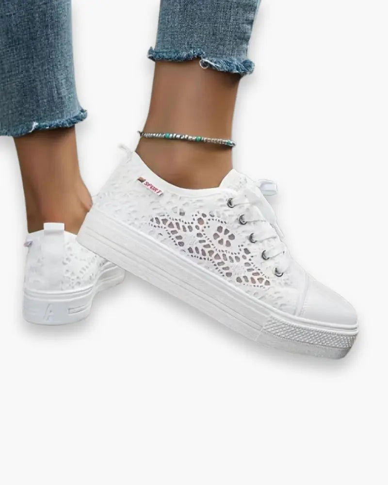 Women's breathable slip-on sneakers in neutral tones, ergonomic sole, sleek professional style