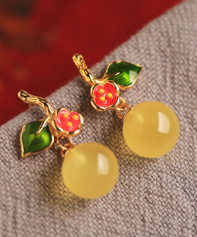 Boucles d'oreilles pendantes élégantes en argent sterling jaune, émail et cire d'abeille. - Urbann-Vibe