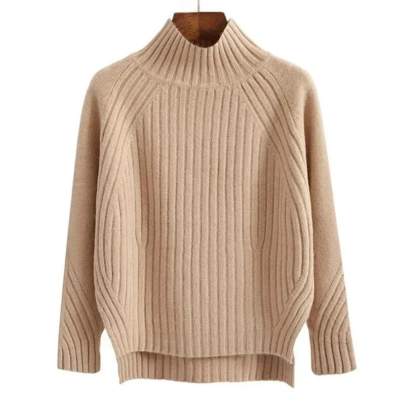 Women's minimalist elegant sweater in neutral tone, clean silhouette with sophisticated noble design