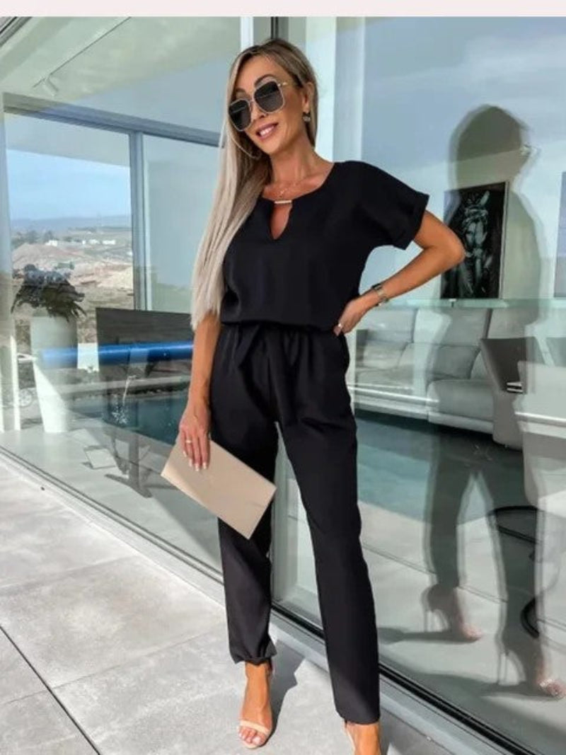 Women's lightweight viscose jumpsuit in solid color with V-neck, elastic waist, and relaxed casual fit
