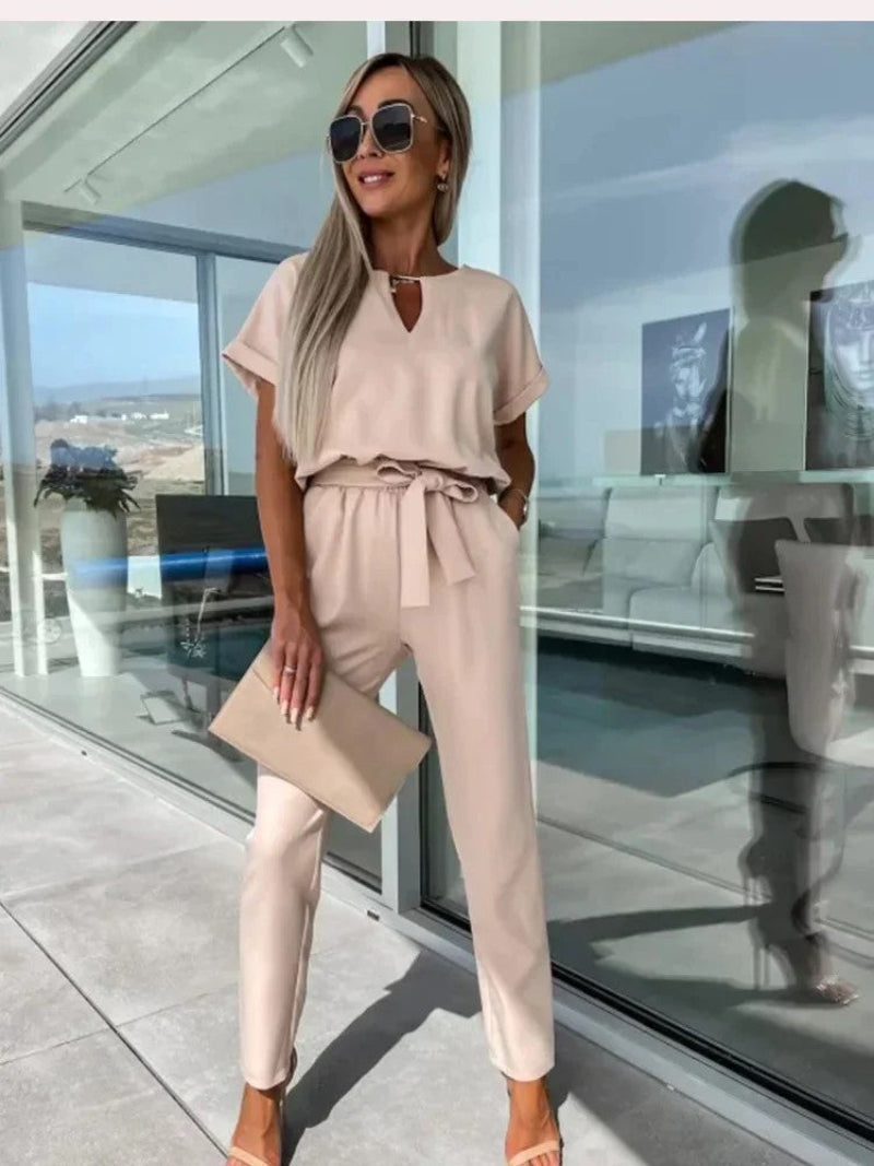 Women's lightweight viscose jumpsuit with V-neck, elastic waist, relaxed fit in solid warm-weather tone