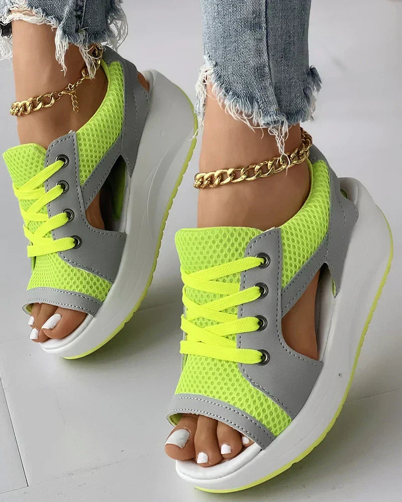 Women's mesh wedge sandals with lace-up closure, breathable upper, and cushioned footbed for all-day comfort