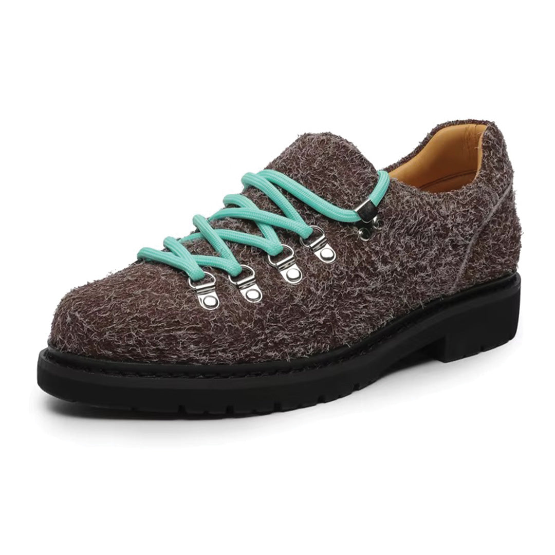 Premium brown suede trail derby boots with padded leather interior and rugged all-terrain rubber lug outsole