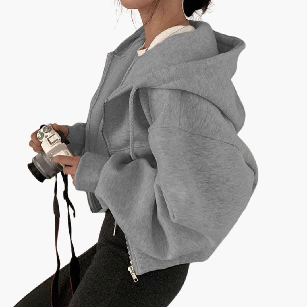 Women's short zip-up hoodie sweatshirt with cozy front pockets and large adjustable drawstring hood