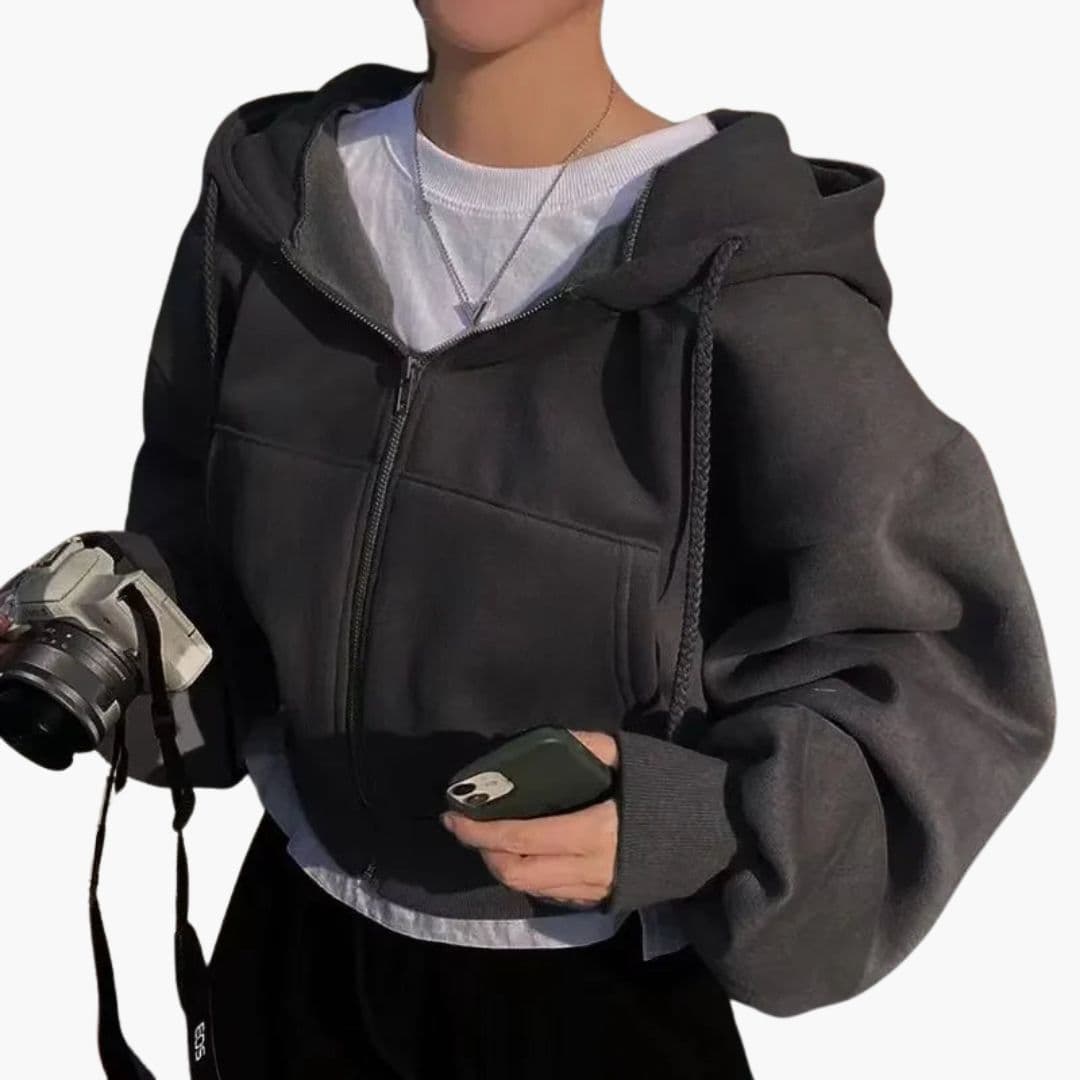 Women's short zip-up hoodie sweatshirt with large drawstring hood and cozy front pockets