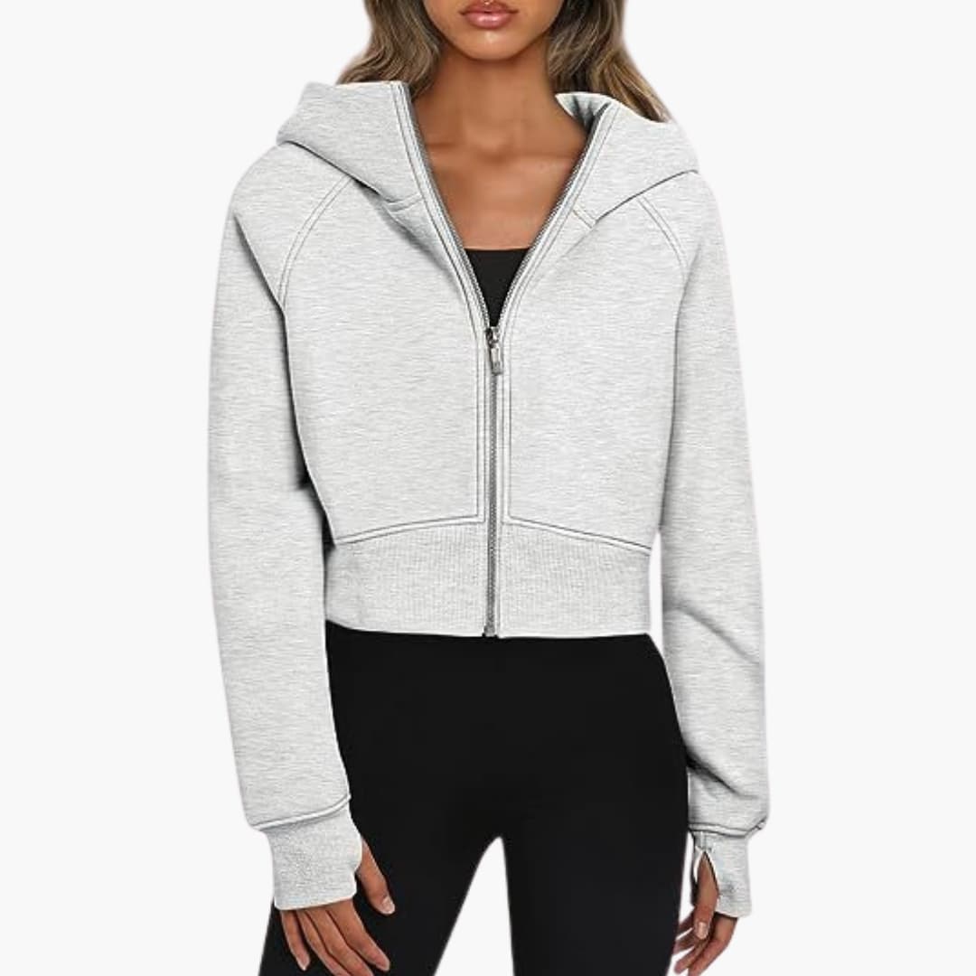Women's short fitted zip hoodie with ribbed hem and integrated hood in sleek minimalist style