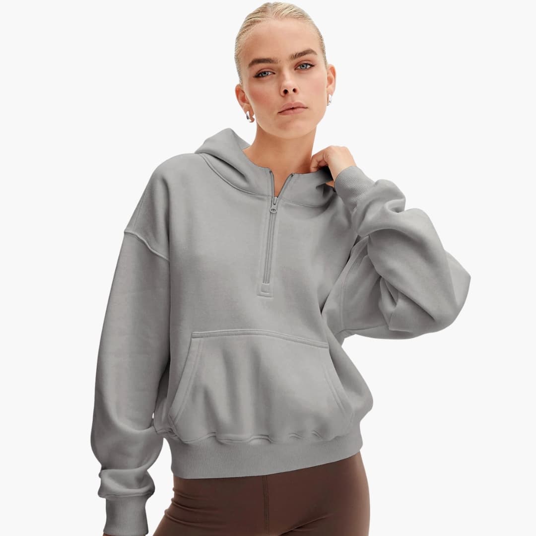 Women's relaxed-fit half-zip hoodie in textured knit with front pocket for casual everyday wear