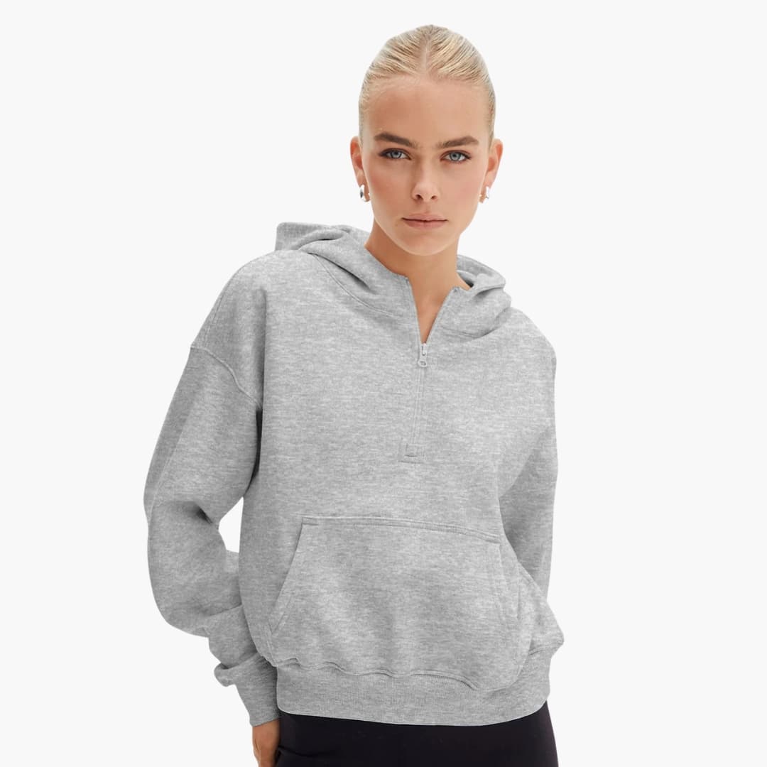 Women's relaxed-fit half-zip hoodie in textured knit with front pocket for casual everyday wear