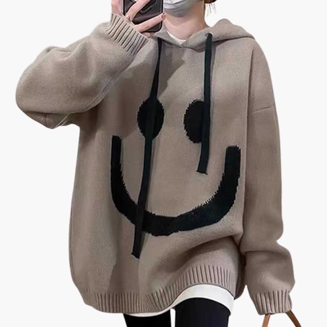 Women's cream loose knit hoodie relaxed fit with bold smile pattern and adjustable drawstring hood