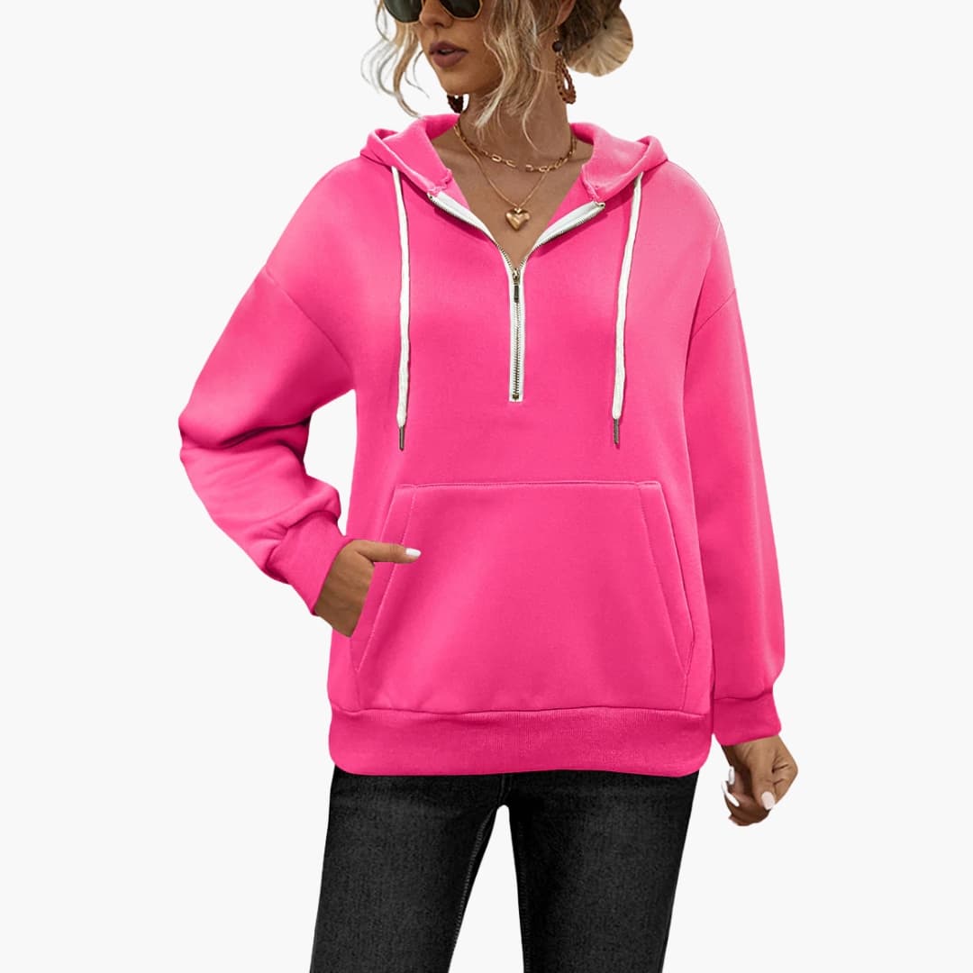 Bright pink women's relaxed fit half-zip hoodie with kangaroo pocket for everyday casual style