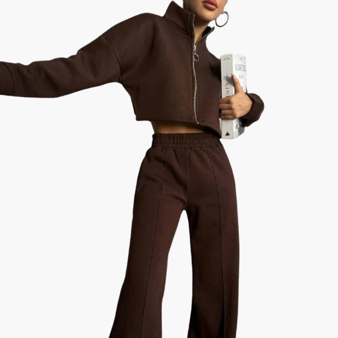 Women's cropped zip-up sweatshirt set with high collar, long sleeves, and matching pants for active wear