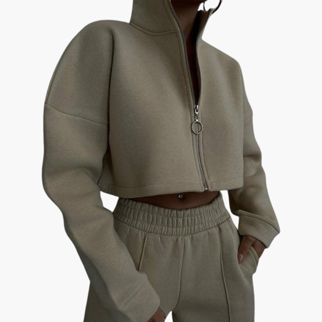 Women's cropped zip-up sweatshirt set with high collar, long sleeves, and matching relaxed-fit pants