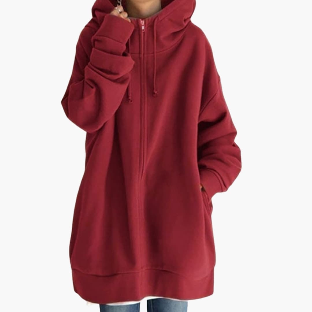 Women's longline zip-up fleece hoodie with side pockets, clean silhouette and lined adjustable drawstring hood