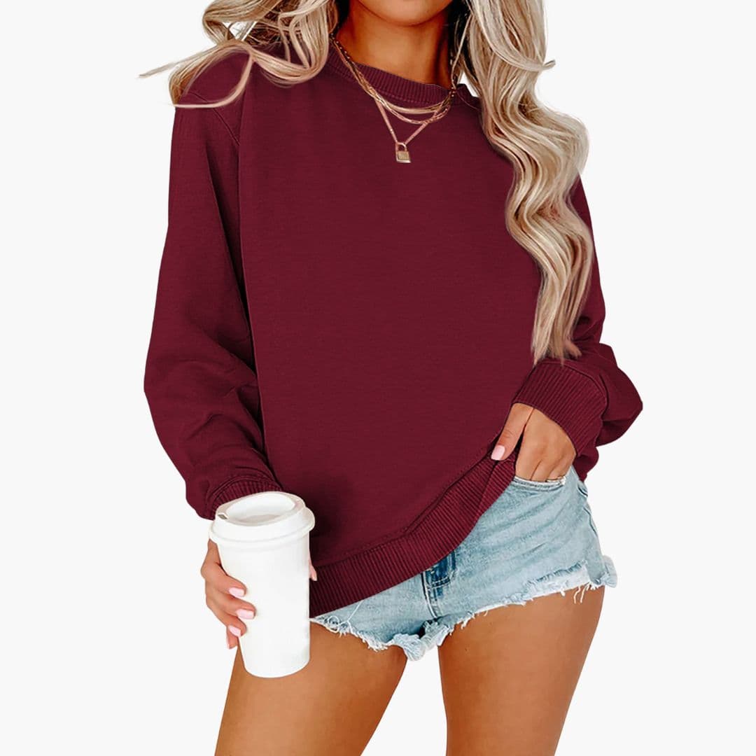 Women's loose fit round neck sweatshirt with ribbed cuffs, casual essential in neutral tone