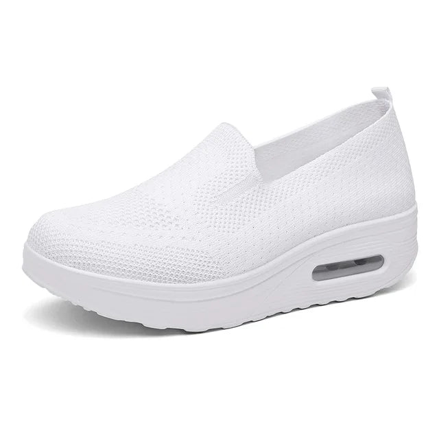 Women's white breathable mesh platform sneakers with orthopedic cushioned insole and slip-on design