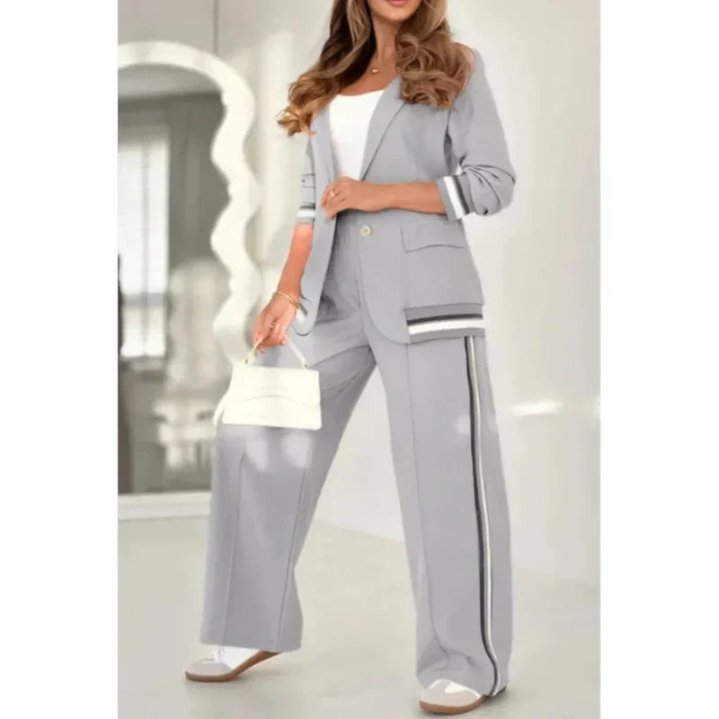 Women's beige 2-piece lounge set with elastic waistband, relaxed fit, and premium soft fabric