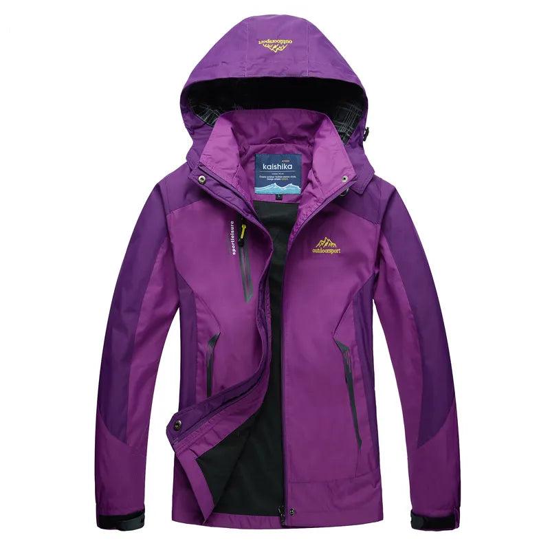 Women's waterproof rain jacket relaxed fit with adjustable hood and zipper pockets for commuters