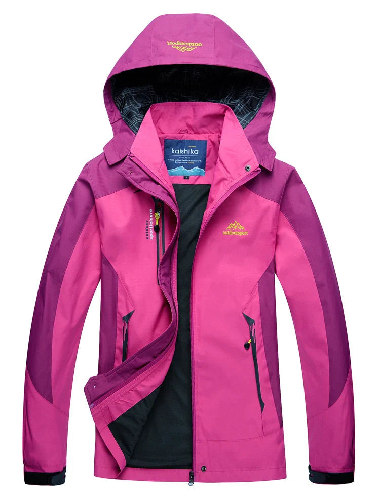 Women's waterproof rain jacket relaxed fit with adjustable hood and zipper pockets for commuters