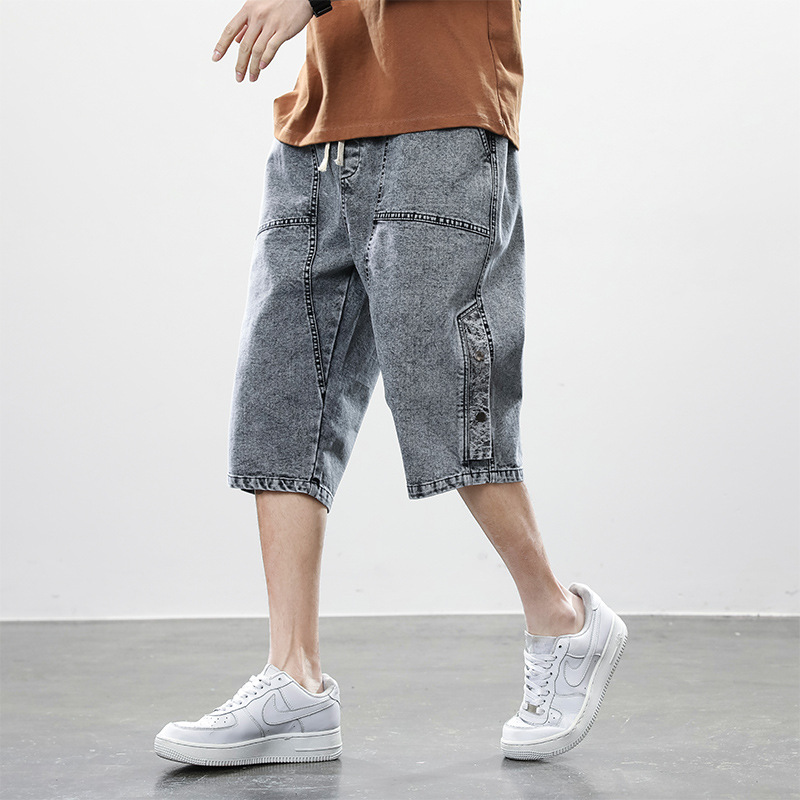 Men's distressed vintage wash denim shorts mid-calf cut drawstring waistband streetwear style