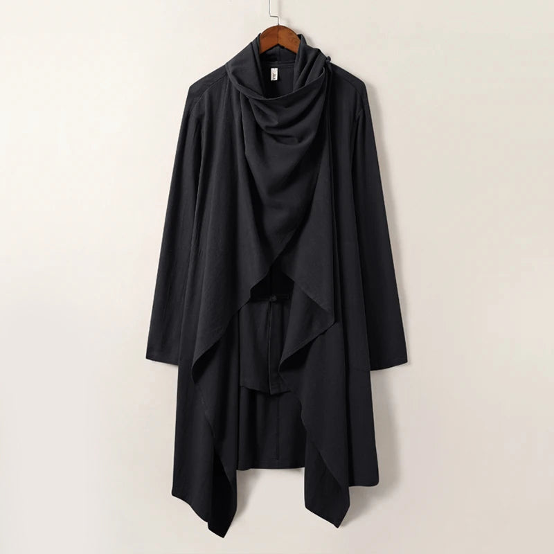 Elegant women's linen blend cape in neutral tones with fluid silhouette and Japanese-inspired knot buttons