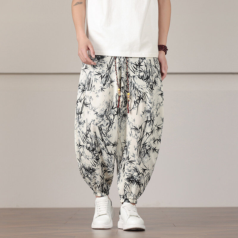 Men's lightweight tapered bamboo print joggers with adjustable bead drawstring, East-inspired streetwear style